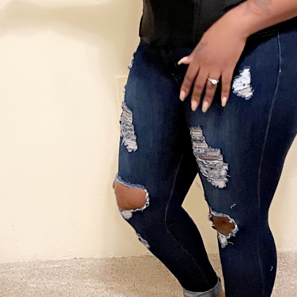 Dark denim distressed jeans